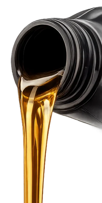 Golden motor oil being poured from a black plastic bottle against a white background.