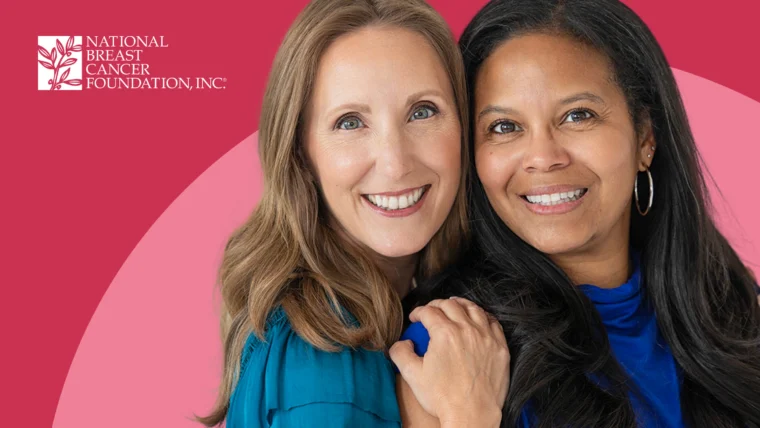 Two smiling women stand close together against a pink background with the National Breast Cancer Foundation, Inc. logo in the top left corner.
