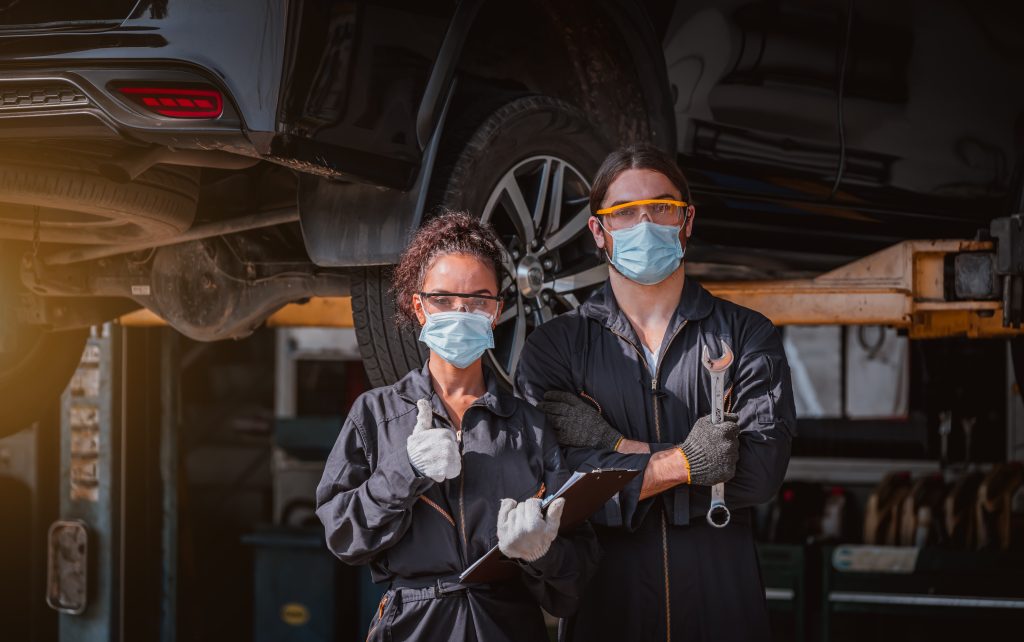 two masked technicians